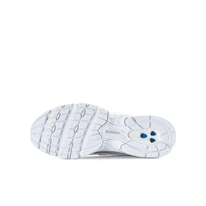 Youth silver metallic sneakers outsole with traction tread and blue logo patch