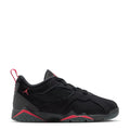 Kids black low-top sneakers with red accents and lace-up