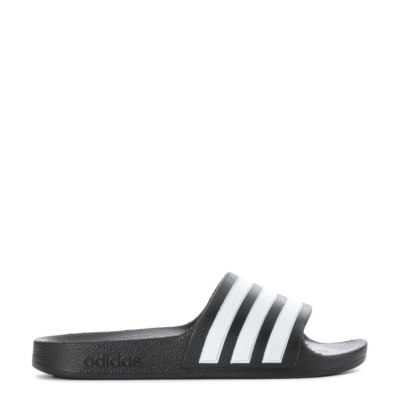 Kids black slide sandals with white triple stripes and molded footbed