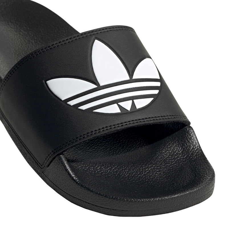 Black slide sandal upper with white adidas trefoil logo on the strap