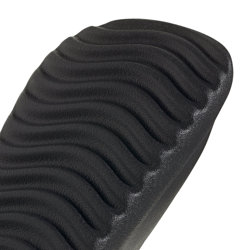 Black molded slide sandal strap with ridged textured surface detail