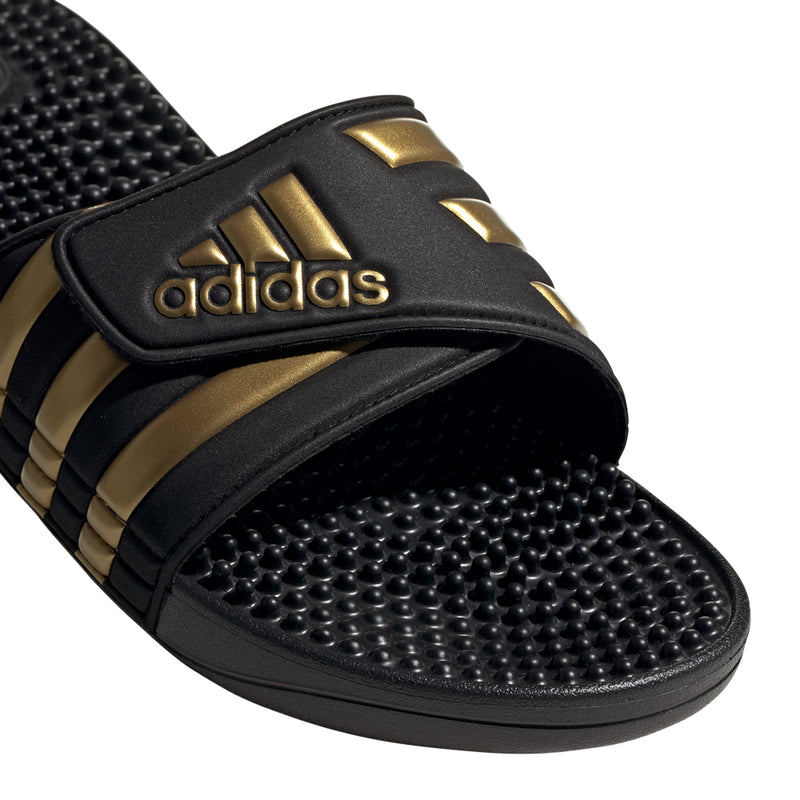 Men's black slide sandal strap with adidas logo and gold bar stripes