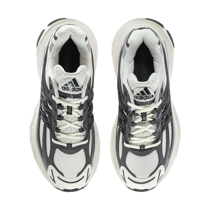 Men's lace-up sneakers with adidas tongue label; grey mesh upper and black interior.