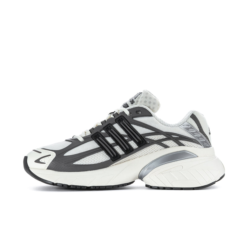 Men's running shoes with grey mesh panels and black stripe details; off-white sole.