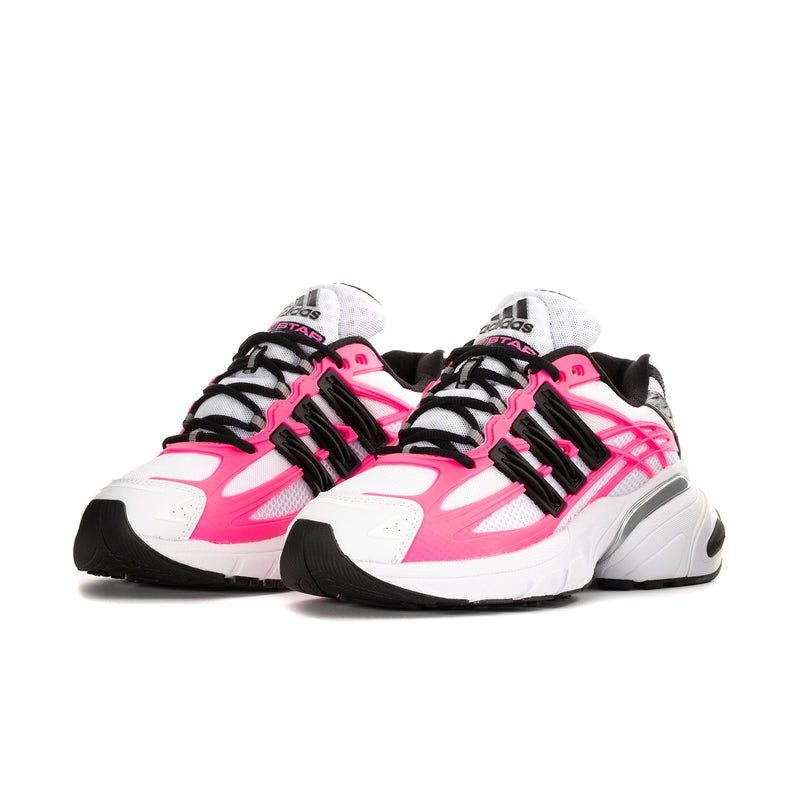Women's athletic sneaker front view in white and hot pink with black stripes and laces