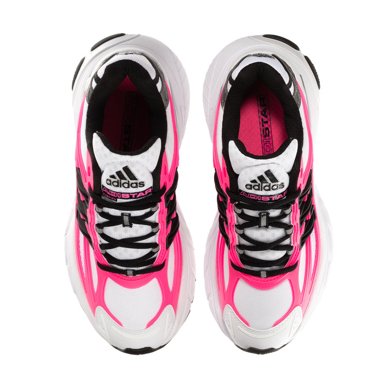 Women's sneaker pair from toe, white uppers with hot pink accents and black lace details