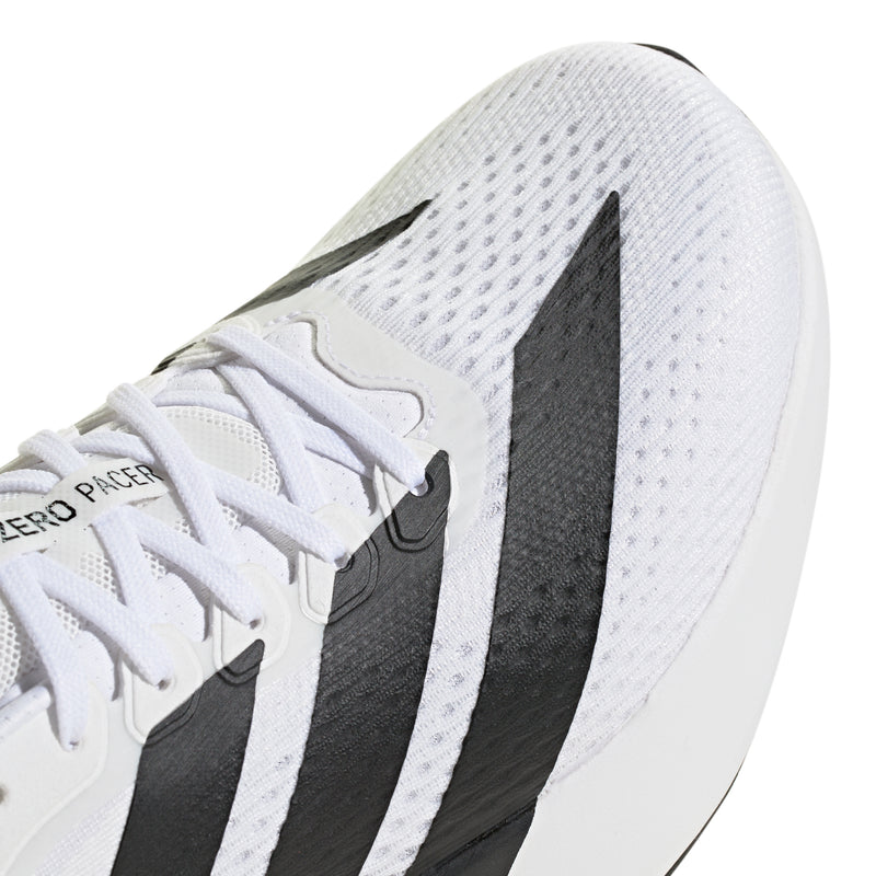 Men's white upper with black stripe overlays and perforated texture