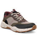 Multicolored sneaker with brown, black, and beige accents on a white background