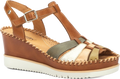 Brown wedge sandal with a white sole on a white background