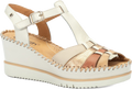 White wedge sandal with gold accents on a white background