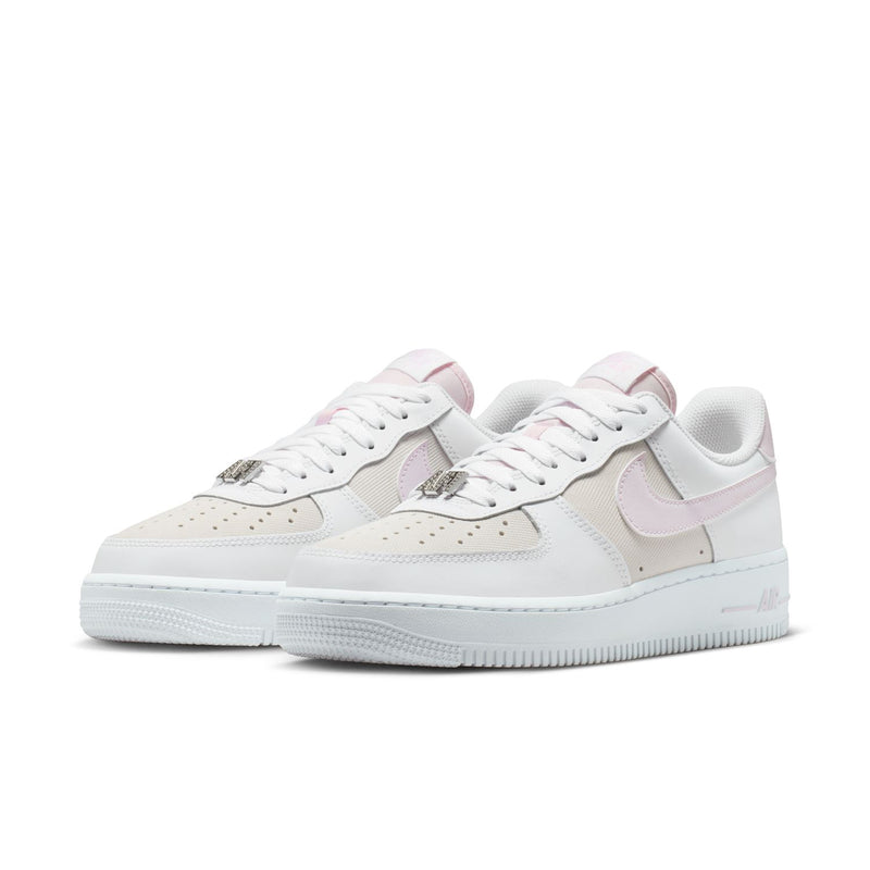 Women's Air Force 1 sneakers, white upper with lilac swoosh, side by side