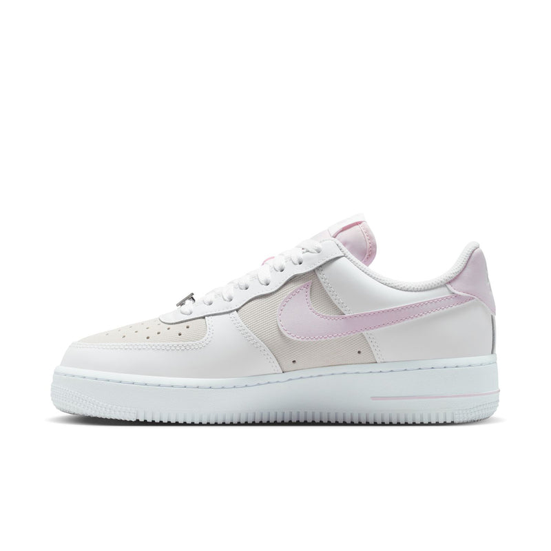 Women's Air Force 1 sneakers in white with lilac swoosh and panels, side angle