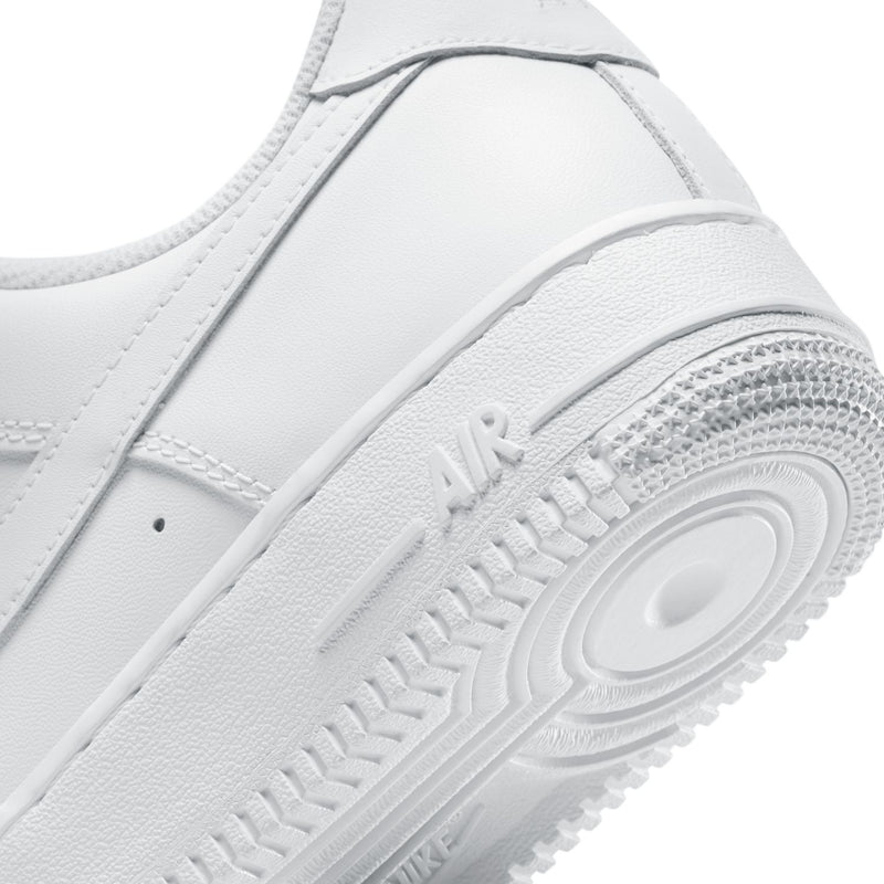 Women's white sneaker side and sole, textured Air cushioning with logo