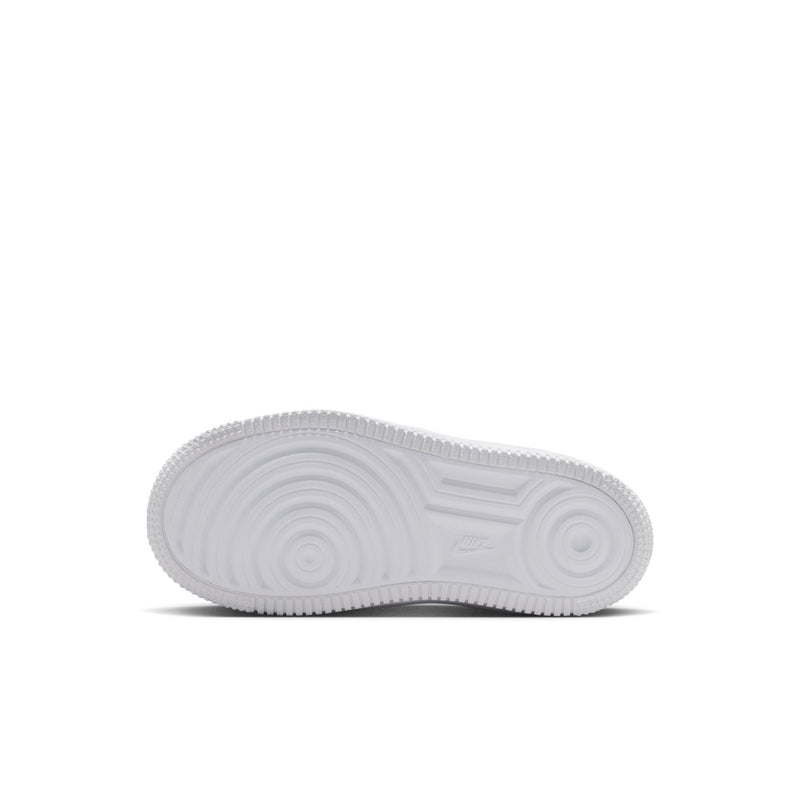 Kids' white rubber outsole with tread, underside view