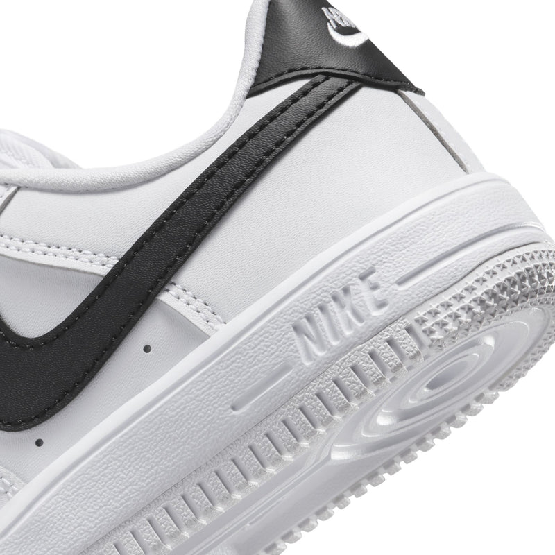 Kids' sneaker midsole and outsole close-up with Nike branding