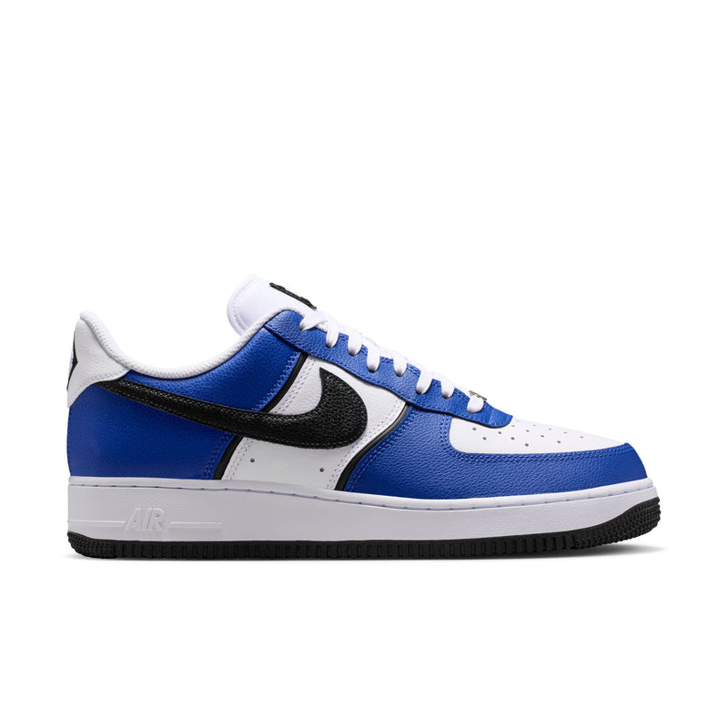 Nike Air Force 1 Low men's sneakers front side view in blue, white, and black.