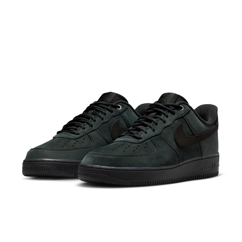 Pair of men's Nike Air Force 1 Low sneakers in dark green suede, black sole