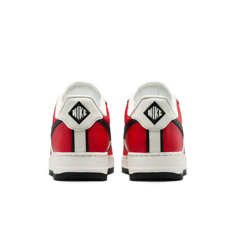 Men's low-top sneakers heels with Nike branding, red side panels, and black heel stripe