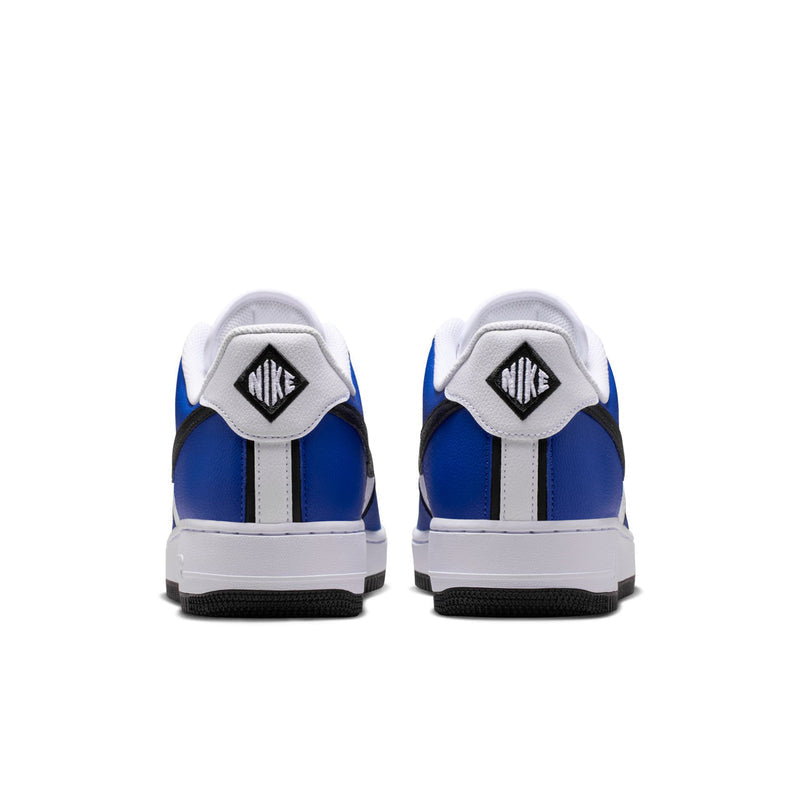 Nike Air Force 1 Low men's sneakers heel view with Nike labels and blue panels.