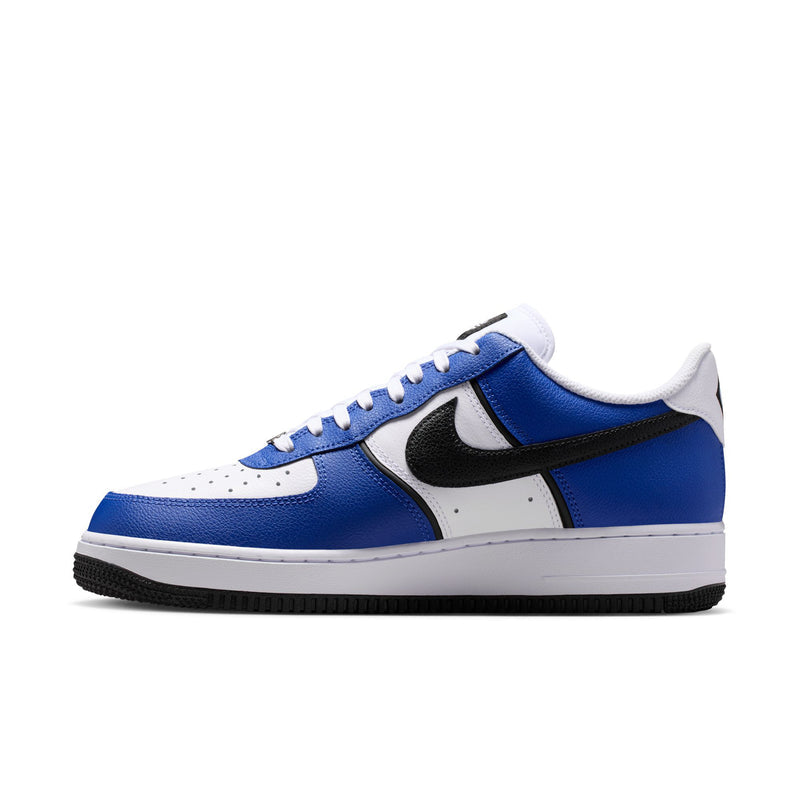 Nike Air Force 1 Low men's sneakers in blue, white, and black with swoosh.
