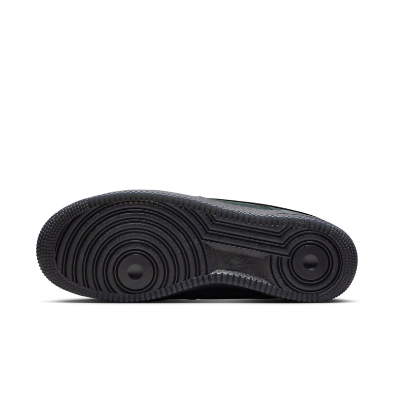 Nike Air Force 1 Low outsole, dark rubber traction with circular tread patterns