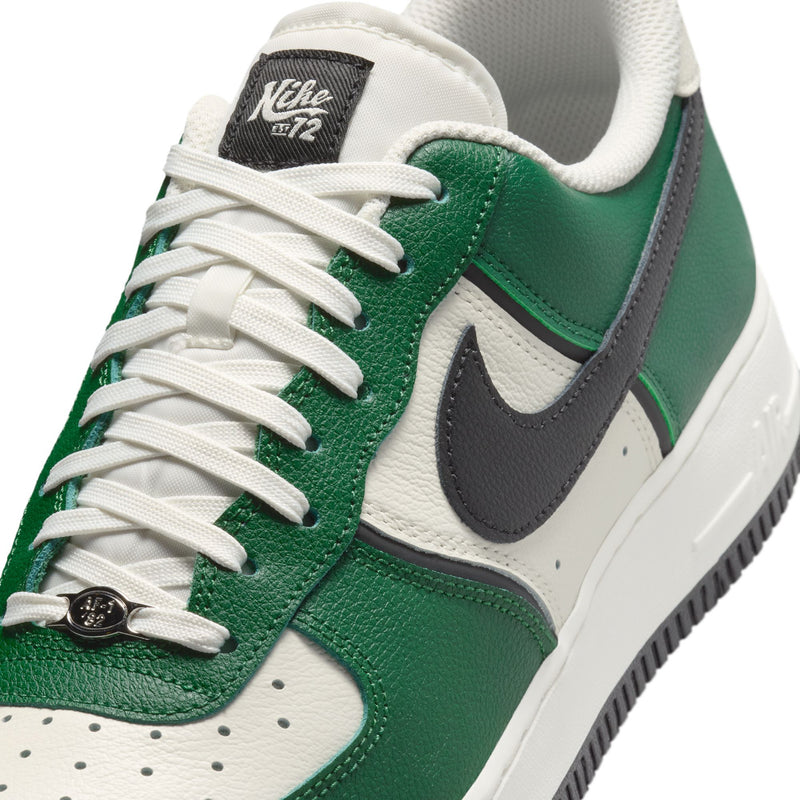 Men's Nike Air Force 1 Low sneakers close-up, white laces on green and white panels