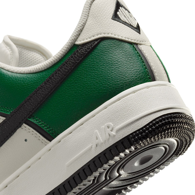 Men's Nike Air Force 1 Low sneakers close-up, Air midsole detail on green upper