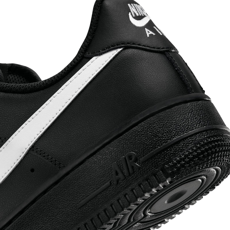 Nike Air Force 1 Low black midsole close-up with Air logo and white stripe