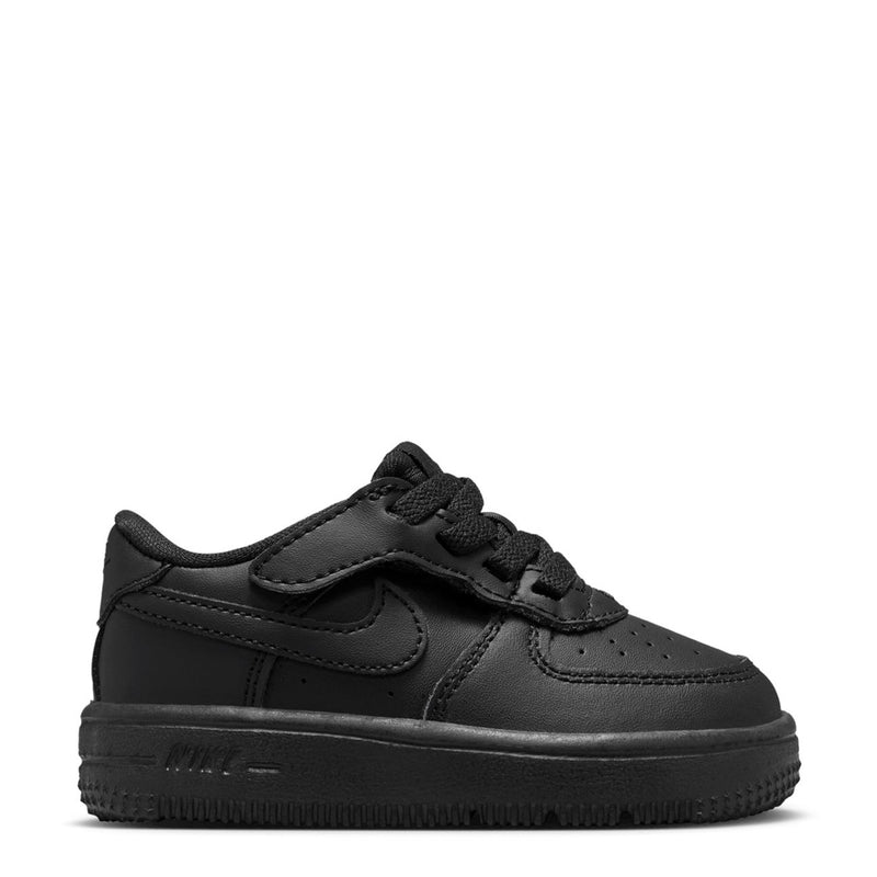 Toddler black low-top sneakers with Nike swoosh and lace-up closure