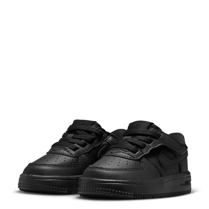 Pair of toddler black low-top sneakers with lace-up fronts and rubber sole