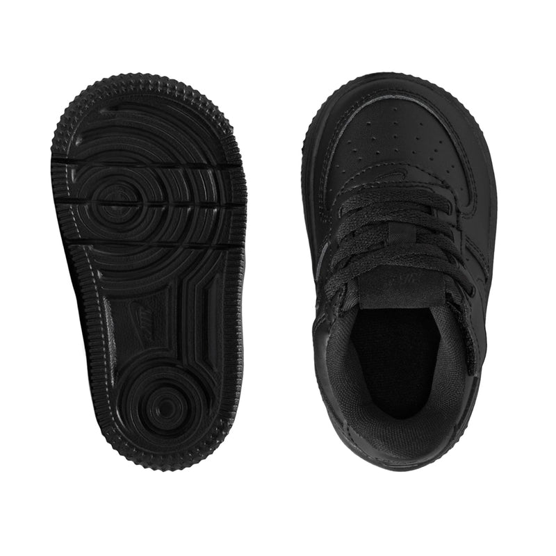 Toddler black sneaker soles, showing textured tread and lace-up toe view