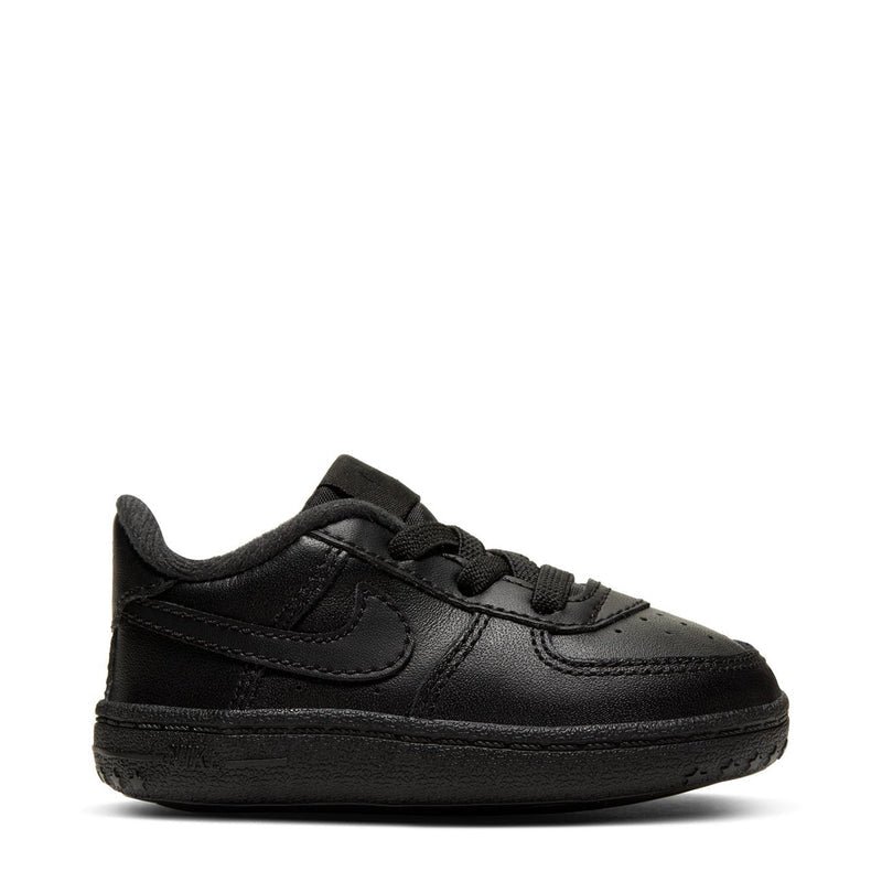 Infant black low-top lace-up sneaker with Nike swoosh and padded collar
