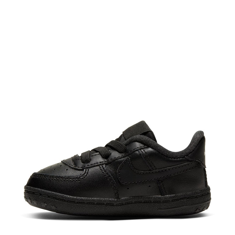 Infant black low-top lace-up sneaker with Nike swoosh and perforated toe