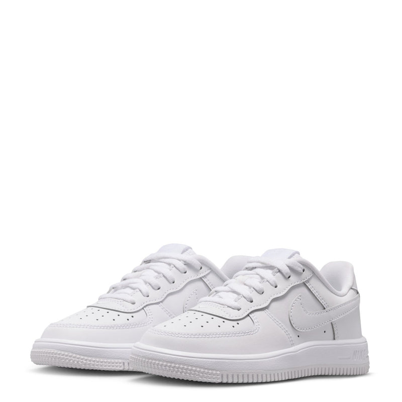 Kids white low-top sneakers shown from side with lace-up detail