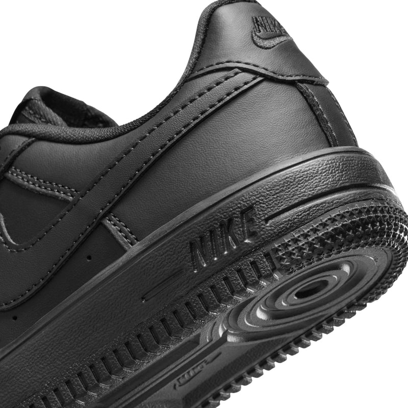 Kids' black Nike Air Force 1 low-top sneaker, close-up of midsole and tread