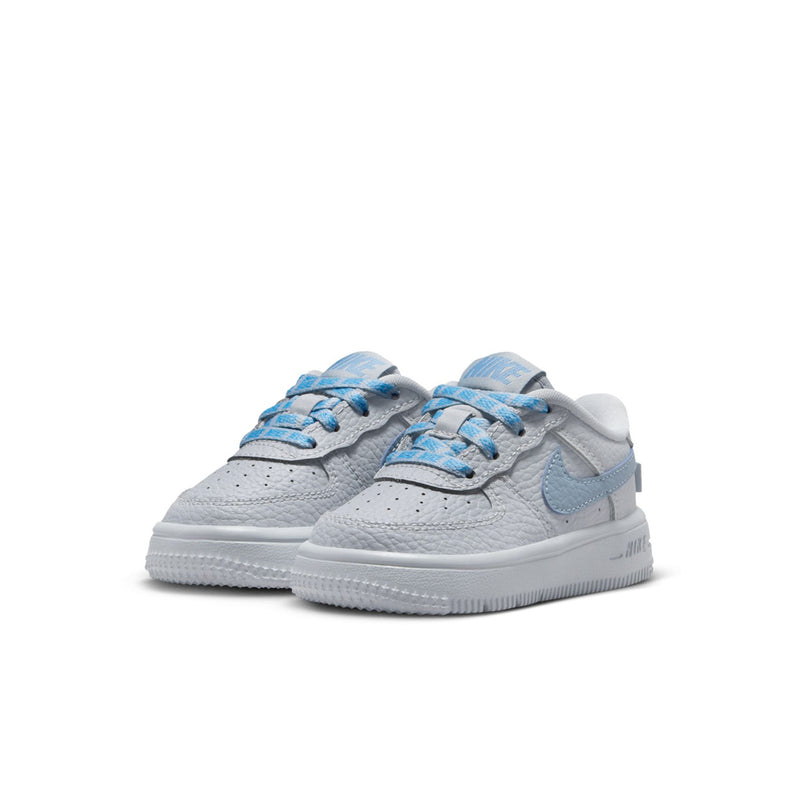 Toddler low-top sneakers, side view, light gray leather with blue lace-up