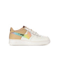 Youth low-top sneakers in white with tan panels and teal swoosh, multicolor accents