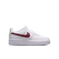 Youth low-top sneakers, white with burgundy Nike Swoosh and maroon strap
