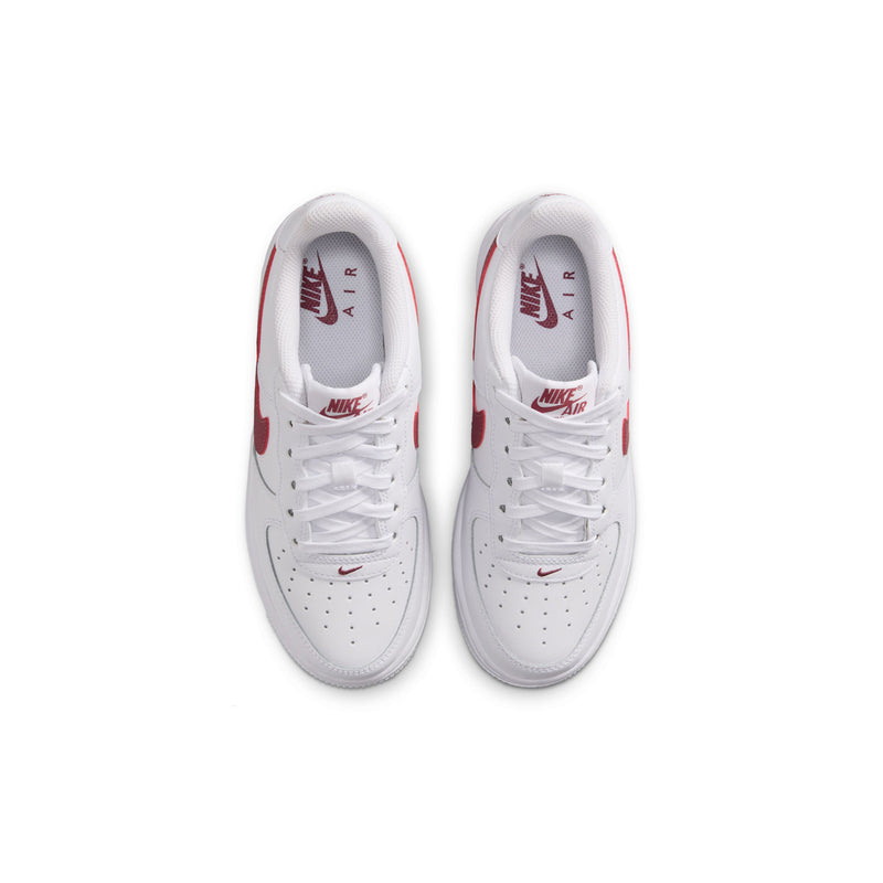 Youth low-top sneakers, white inner view with Nike Air logo on tongue
