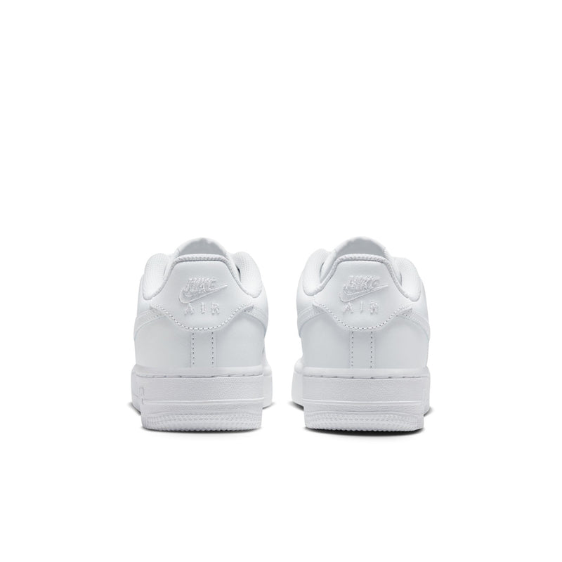 Youth low-top sneakers heel view, white with Nike logo and cushioned back
