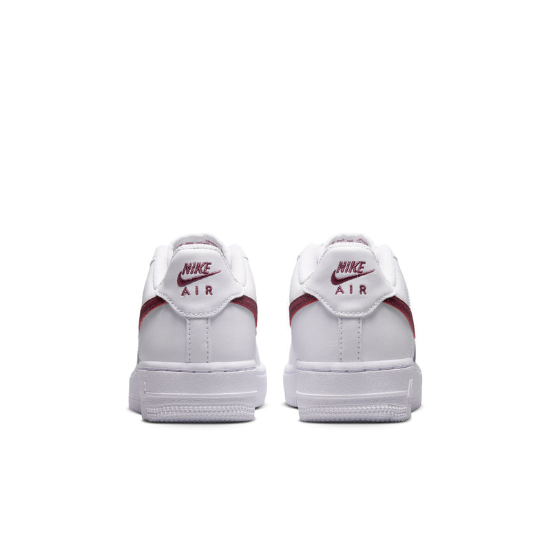 Youth low-top sneakers, white heels with Nike Air branding and burgundy details