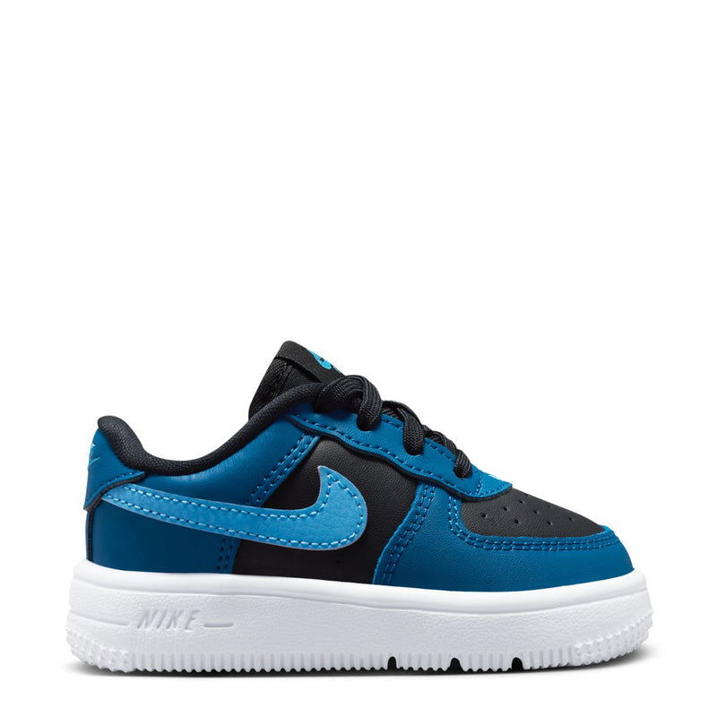 Toddler Nike sneakers in blue and black with white rubber sole and swoosh