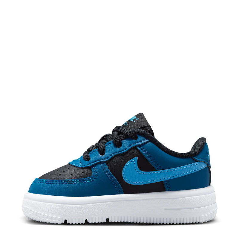 Toddler Nike low-top sneakers, blue upper with black laces and white midsole