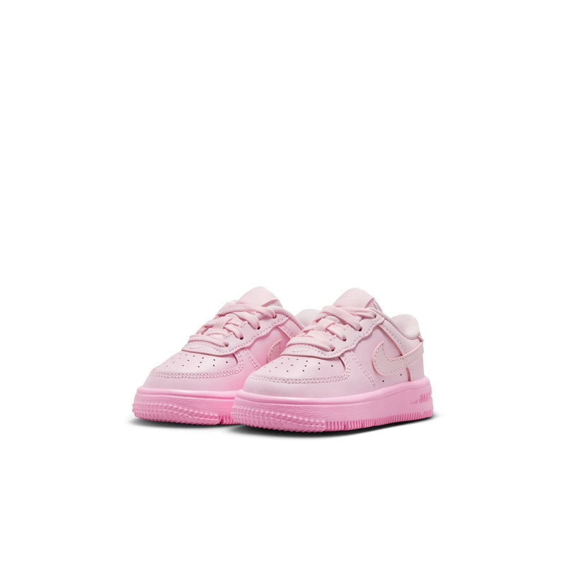 Pink toddler lace-up sneakers, side-by-side view with perforations and rubber sole
