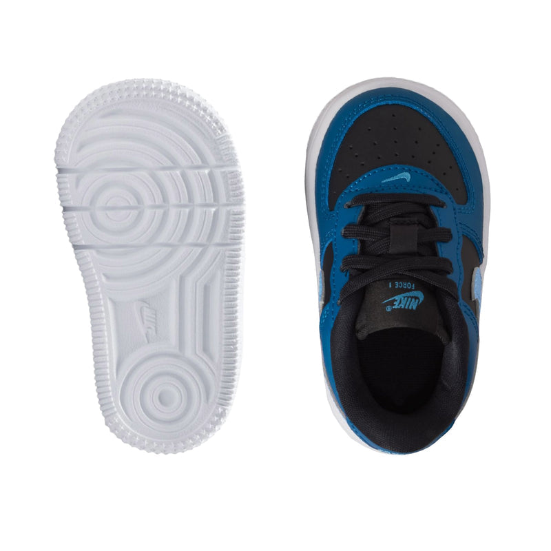 Toddler Nike sneaker soles, white outsole with blue interior lining