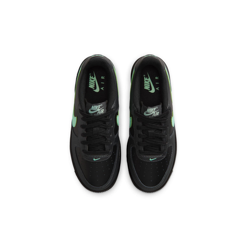 Two youth sneakers shown from above, black interior with mint green Air branding.