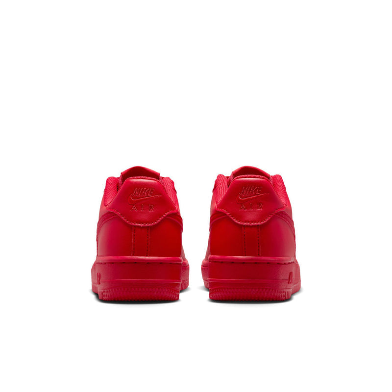 Red youth sneakers from the back with heel tabs and Air branding