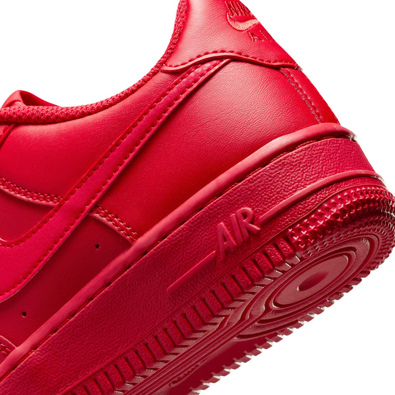Close-up of red youth sneaker sidewall with AIR text on the midsole