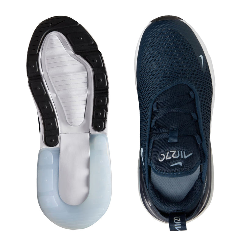Kids Nike sneaker heel view, navy upper and white insole with outsole tread