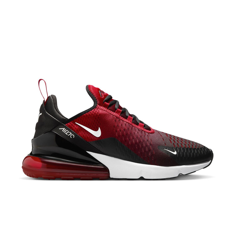 Men's Nike Air sneaker in red, black, and white; lace-up with swoosh.